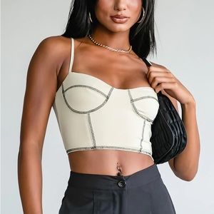 beige princess Polly crop top with black stitching details